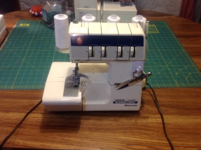 White Superlock 734 DW Serger. Purchased for $150 with the advice that parts couldn't be found once they wore out. Not so! In the age of the Internet, finding blades and parts has not been a problem at all... this ended up being a fantastic purchase. I use it with each project.