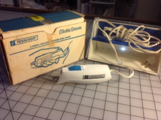Electronic scissors in the original box (unused) with a JC Penny's tag. Found for $6.00 amongst a cluttered crafting shelf in the thrift store.