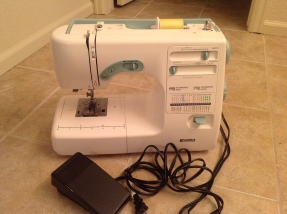 Kenmore model # 385-16231, Found at a neighborhood thrift for $29.99. Apparently this version of the Kenmore Machine was produced by Janome. This lovely machine has a wonderfully quiet and smooth motor. The stitches are refined and steady. Bonus features are a treat: needle up/down, speed control, needle threader, automatic buttonholes, etc.) The cornflower-blue accents on the machine are a nice touch too.