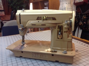 1950's Singer 403. This Vintage machine utilizes "cam" or cartridges to form anything other than a straight stitch. Found for $8.00 at Goodwill.