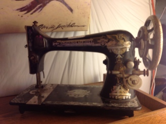 The infamous Singer Model 27 with the Golden Sphynx/Memphis Egyptian decal (treadle version, Spoked handwheel) It is badly worn, and will do well with some cleaning and care.